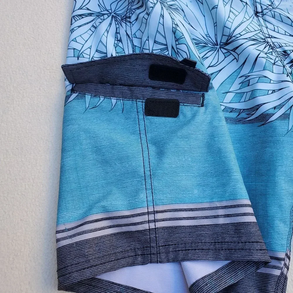 Maui and Sons blue gray and black board shorts